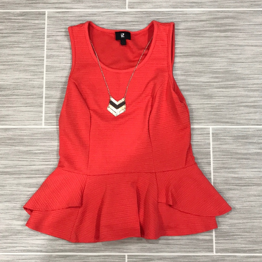 Sleeveless peplum top